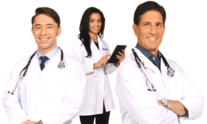three physicians smiling and posing