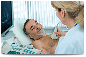 patient smiling while getting chest ultrasound