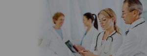 doctors looking at tablet
