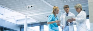 doctors reviewing pacs medical imaging on tablet